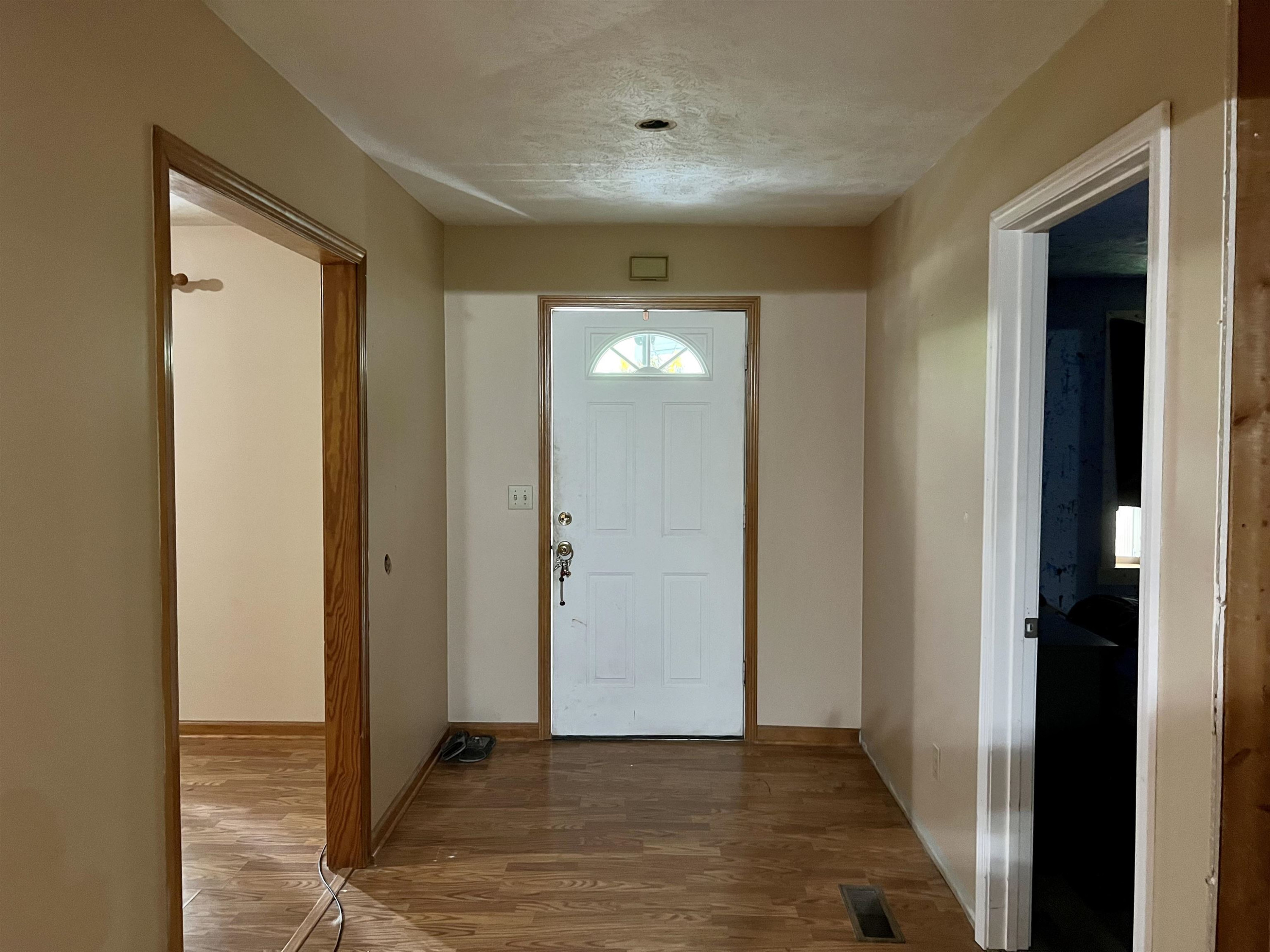 6100 Enville Road Henderson, TN 38340 - Photo 19 of 25 a view of a hallway with wooden floor