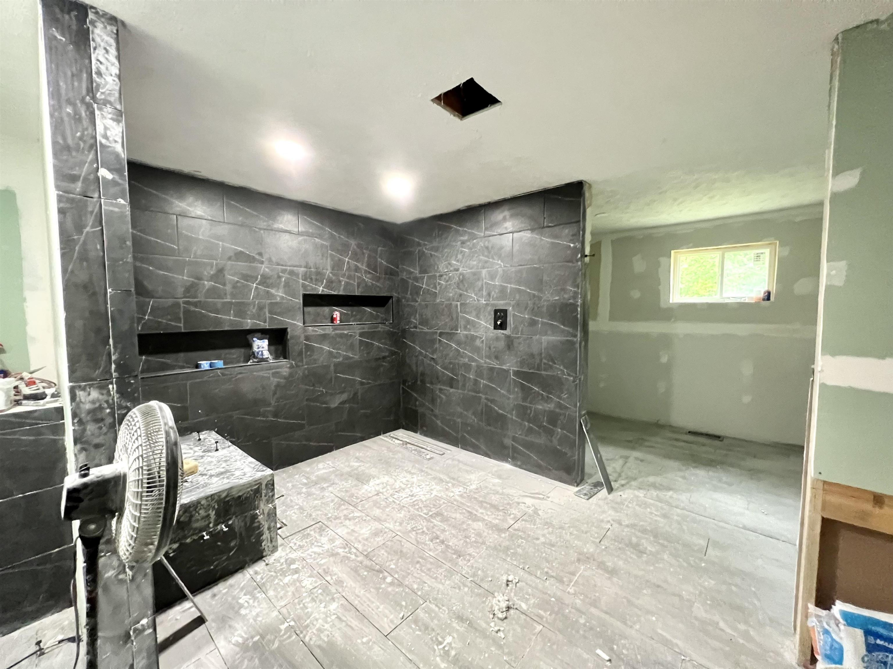 6100 Enville Road Henderson, TN 38340 - Photo 7 of 25 a bathroom with a sink and mirror