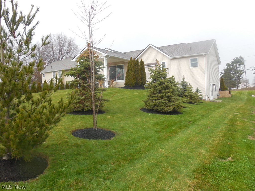 6690 Heisley Road Mentor, OH 44060 - Photo 33 of 35 Landscaped back yard