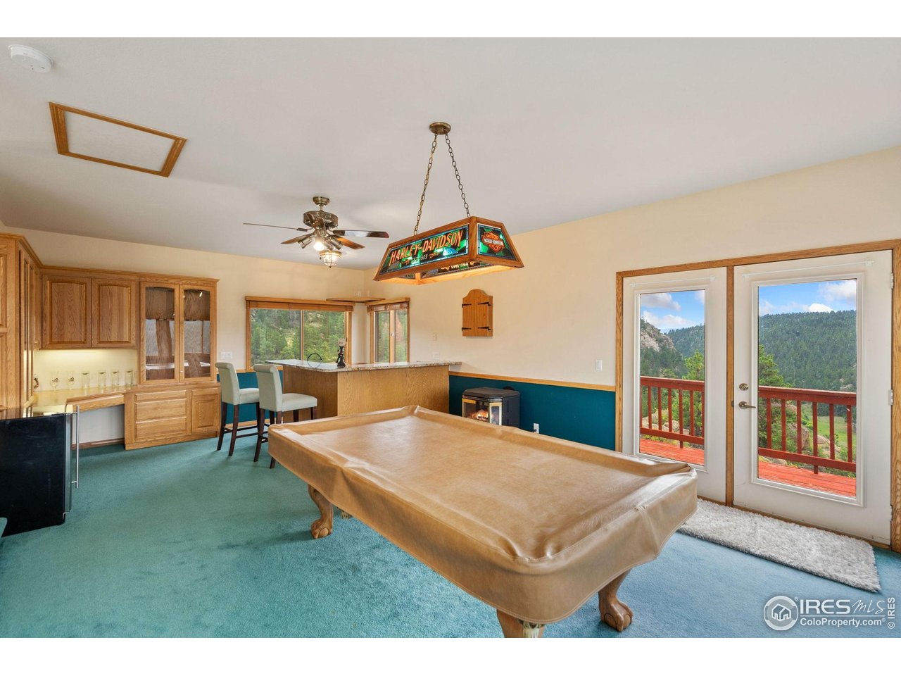 366 North Rim Road Livermore, CO 80536 - Photo 18 of 30 A perfect place for a game of pool or entertaining friends. Pool table stays