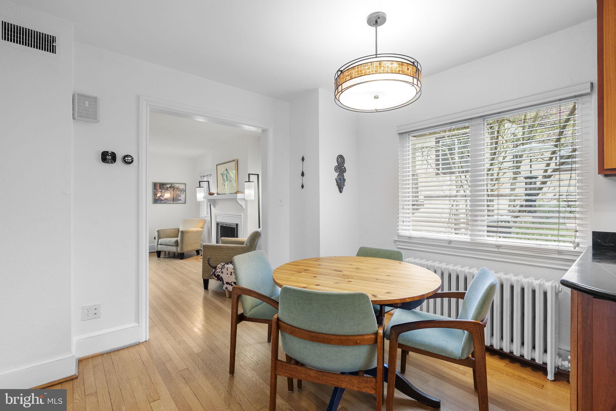 314 Dale Drive Silver Spring, MD 20910 - Photo 12 of 49 a view of a dining room with furniture window and wooden floor