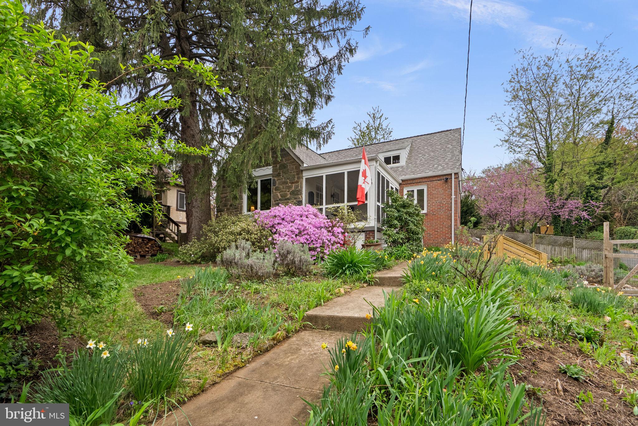 314 Dale Drive Silver Spring, MD 20910 - Photo 2 of 49 a front view of a house with garden