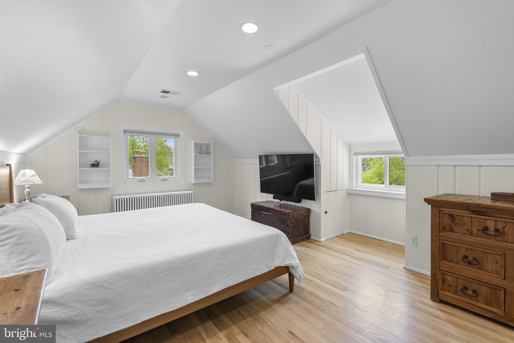 314 Dale Drive Silver Spring, MD 20910 - Photo 22 of 49 a bedroom with a bed and a television