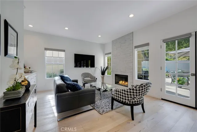 a kitchen with stainless steel appliances a refrigerator and a stove top oven