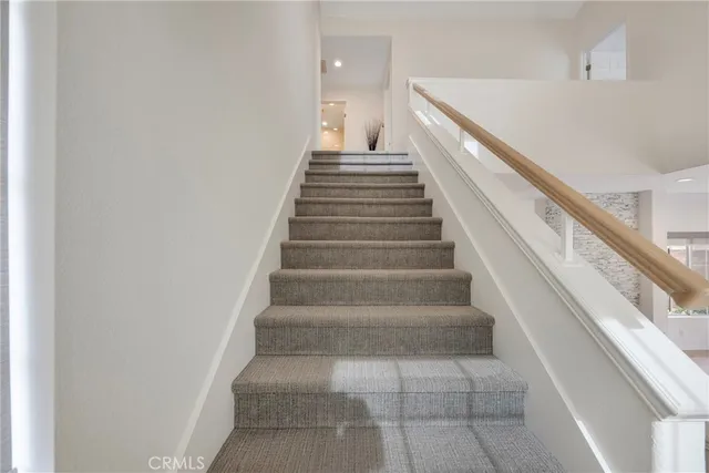 a view of a street with a building in the background