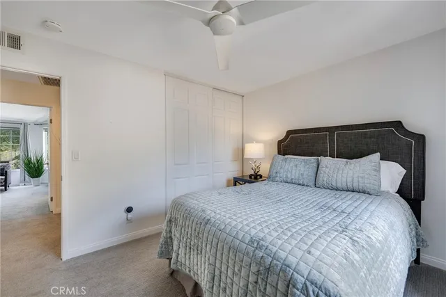a en suite bathroom with double sink and a mirror