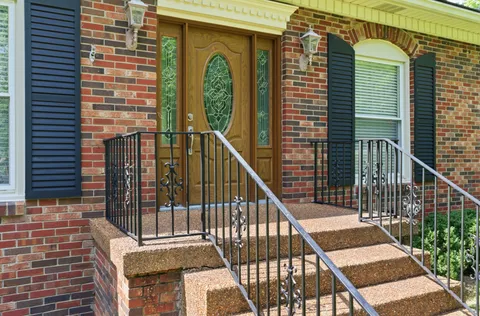a view of a balcony with wooden floor