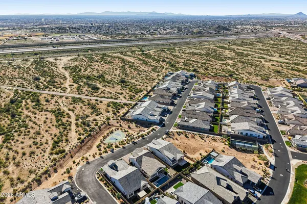 an aerial view of residential building and lake view
