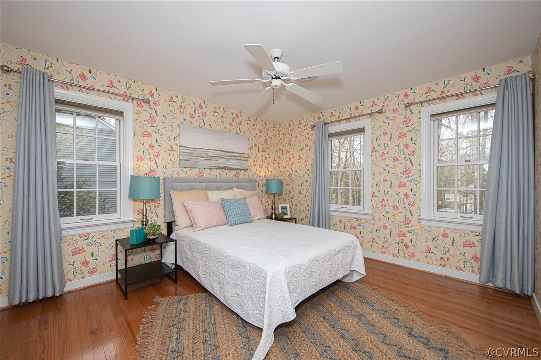 4010 Poplar Grove Road Midlothian, VA 23112 - Photo 24 of 49 a bedroom with a large bed and a large window