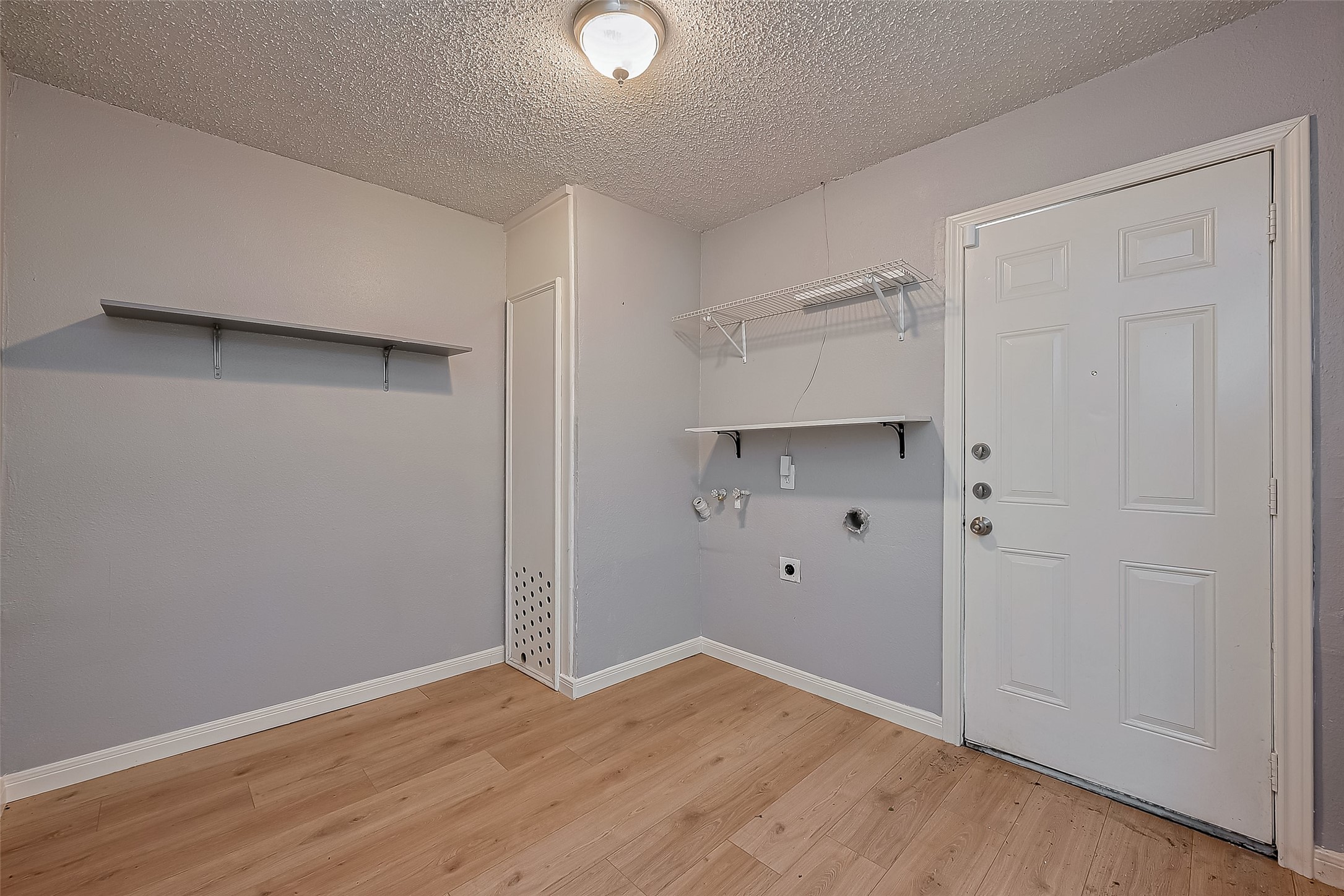 206 Beaver Bend Road Houston, TX 77037 - Photo 21 of 38 a view of an empty room with wooden floor