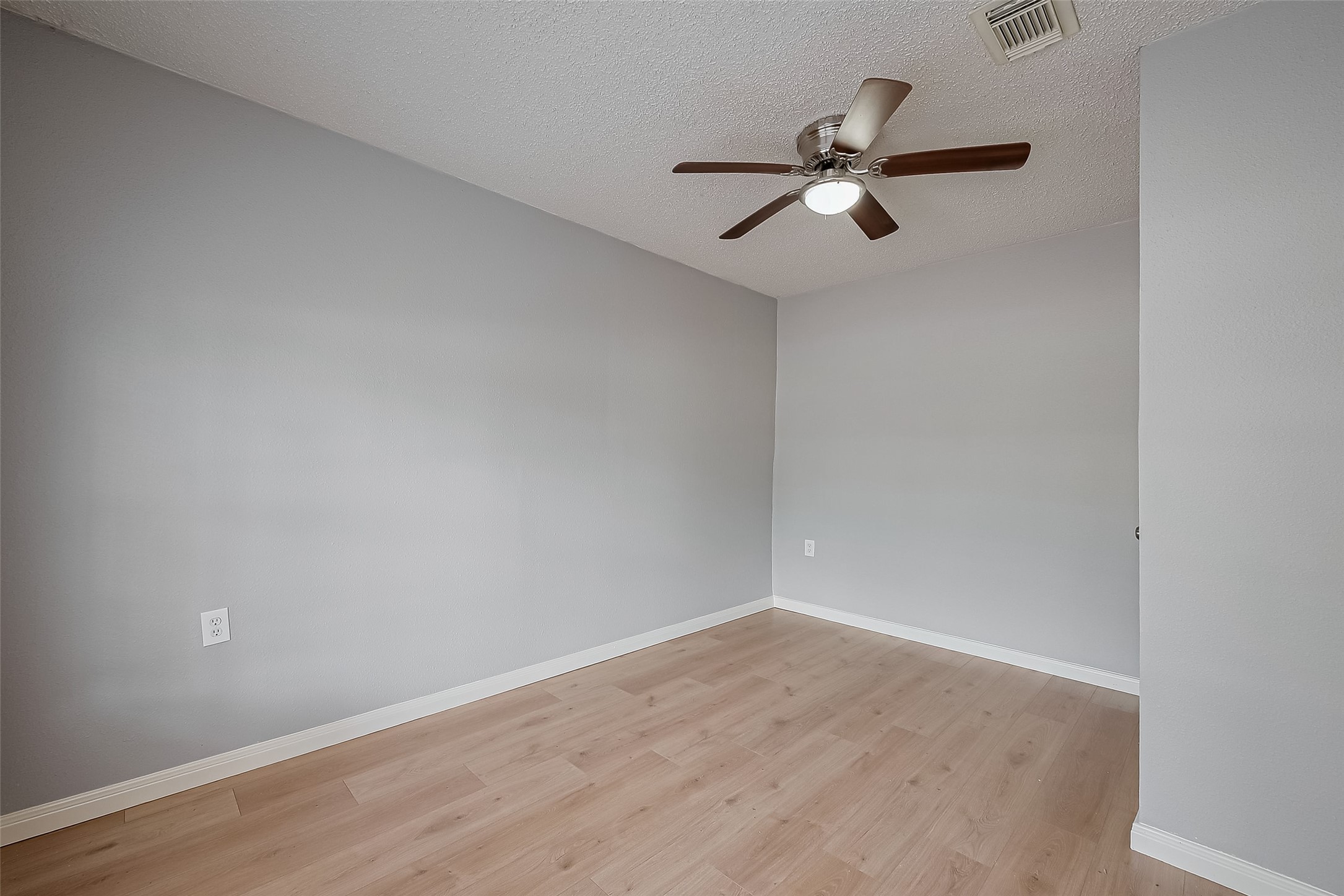 206 Beaver Bend Road Houston, TX 77037 - Photo 22 of 38 wooden floor in an empty room