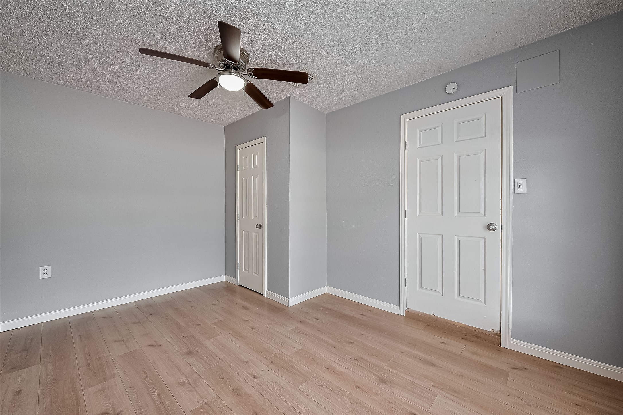 206 Beaver Bend Road Houston, TX 77037 - Photo 23 of 38 a view of empty room with wooden floor