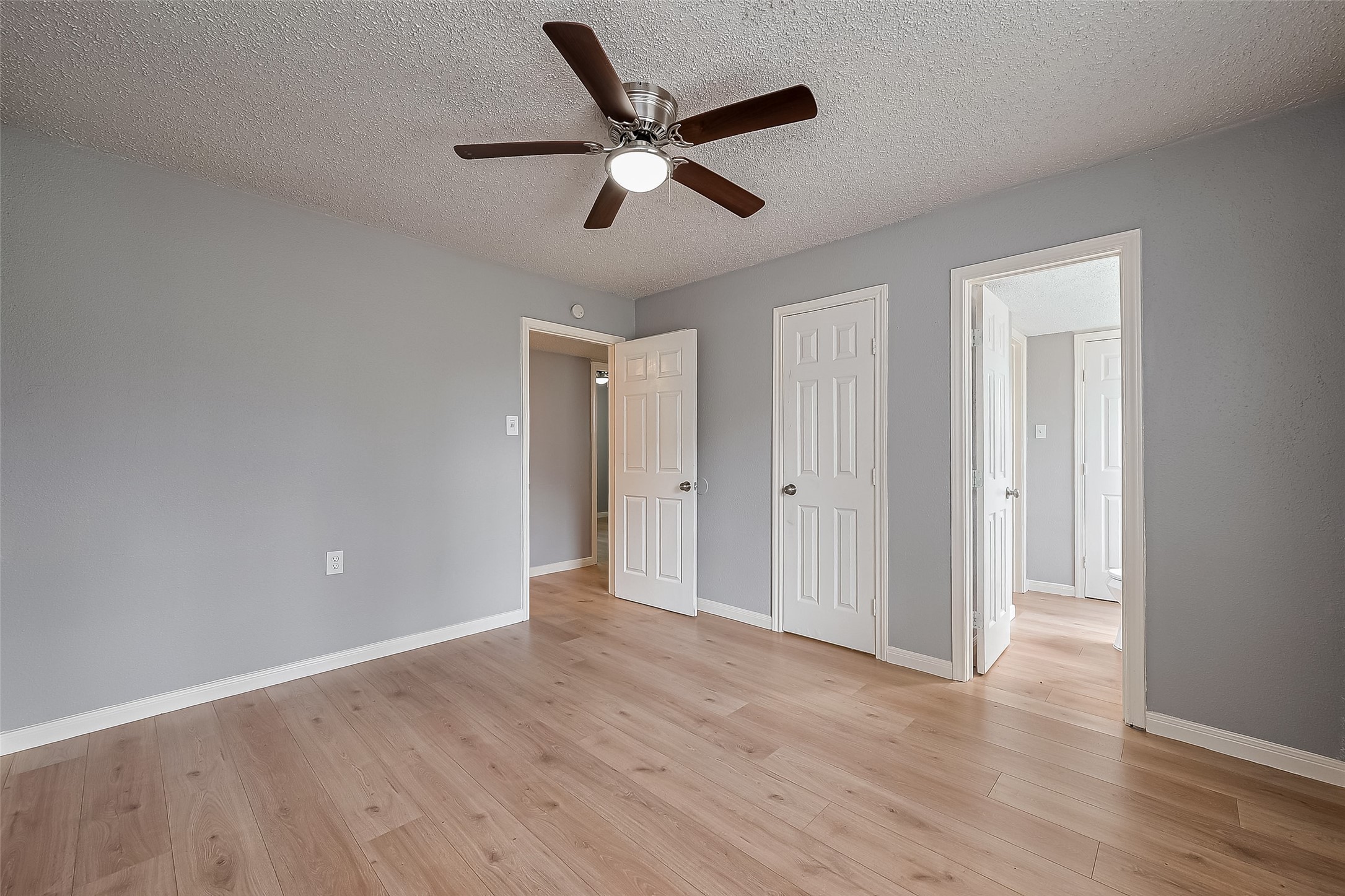 206 Beaver Bend Road Houston, TX 77037 - Photo 29 of 38 a view of an empty room with wooden floor