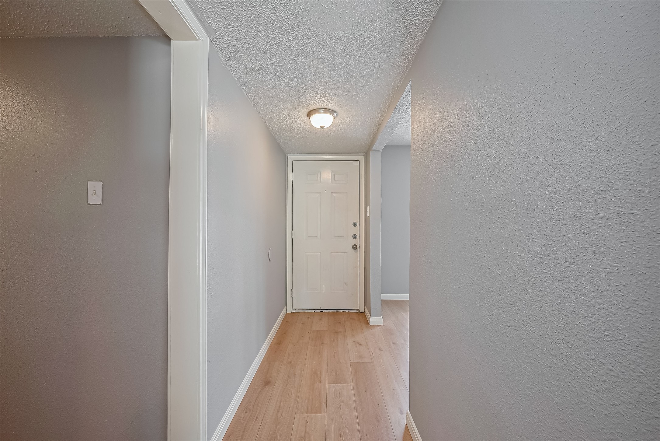 206 Beaver Bend Road Houston, TX 77037 - Photo 9 of 38 a view of hallway with wooden floor