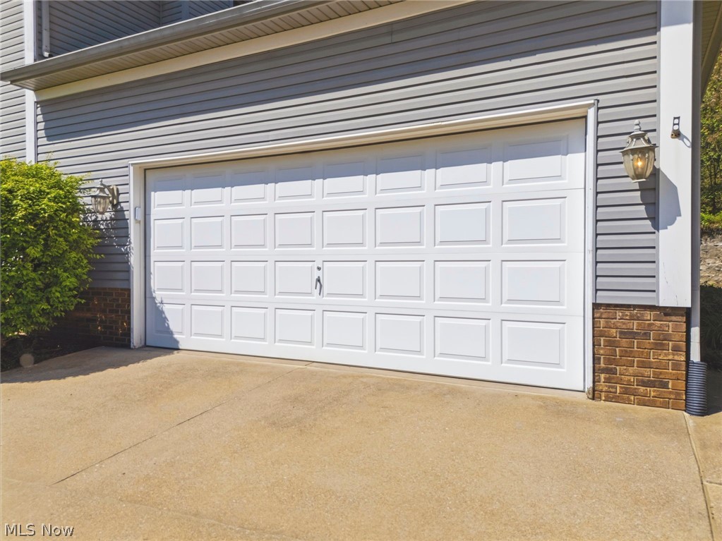 5347 Ashby Street Northwest Canton, OH 44708 - Photo 43 of 46 2 car over sized garage with extra parking pad