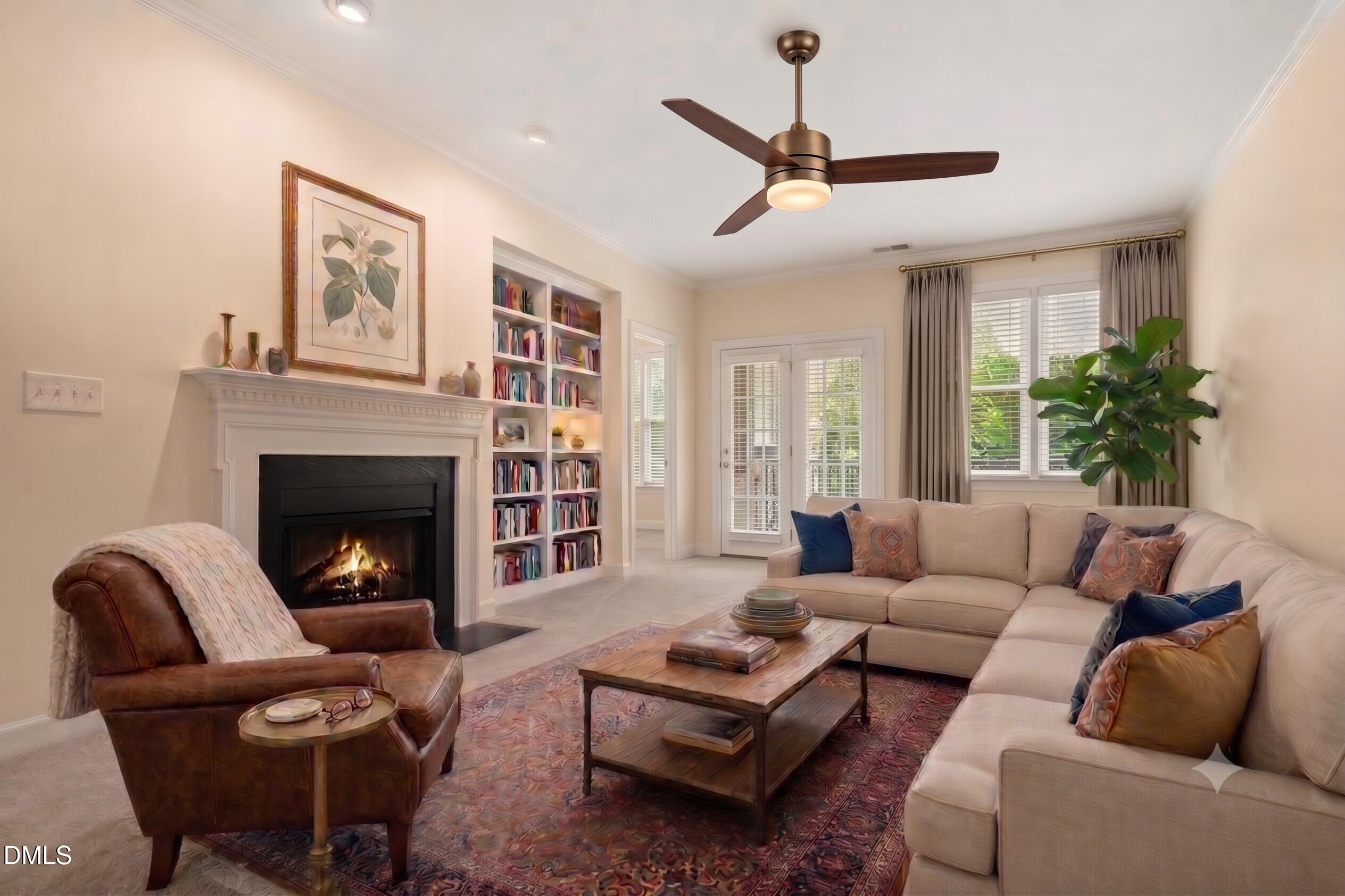 2651 Mellowfield Drive, Unit 203 Raleigh, NC 27604 - Photo 3 of 32 a living room with furniture a window and a fireplace