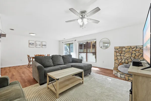 a living room with furniture and a window
