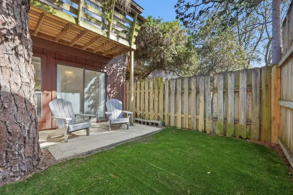 a backyard of a house with lots of green space