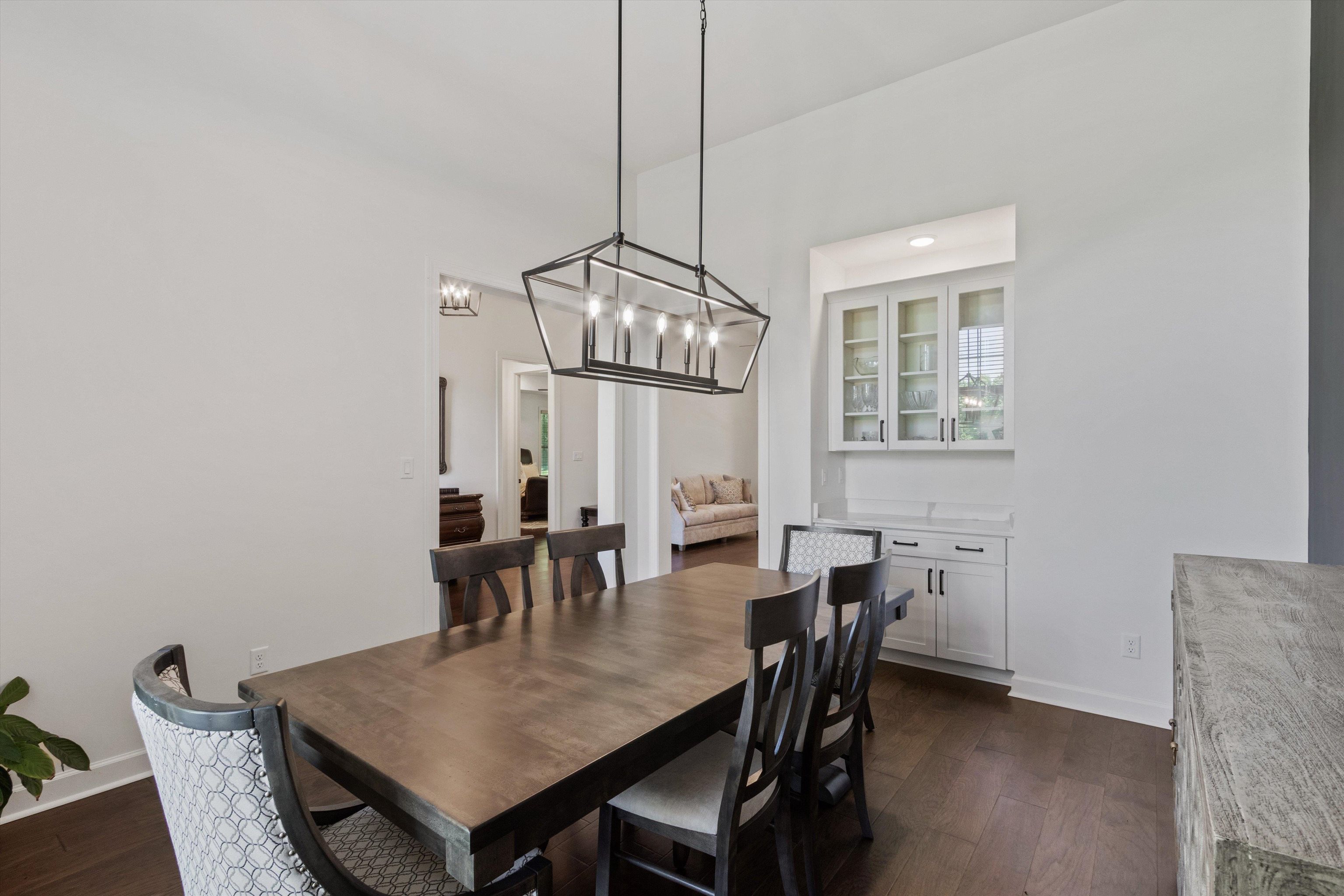 65 Watson Road Oakland, TN 38060 - Photo 7 of 40 a view of a dining room with furniture and chandelier