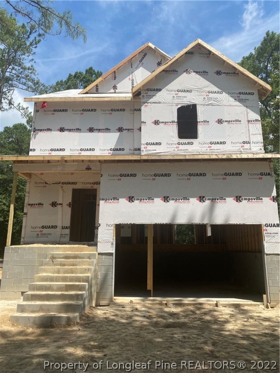 760 Daphne Lane Vass, NC 28394 - Photo 15 of 15 a view of building with roof