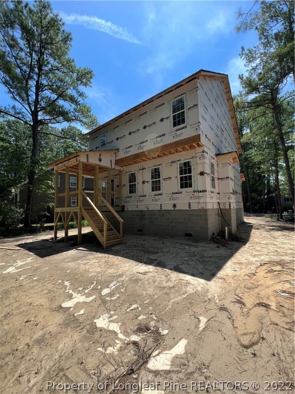 760 Daphne Lane Vass, NC 28394 - Photo 4 of 15 a front view of a house with cars parked
