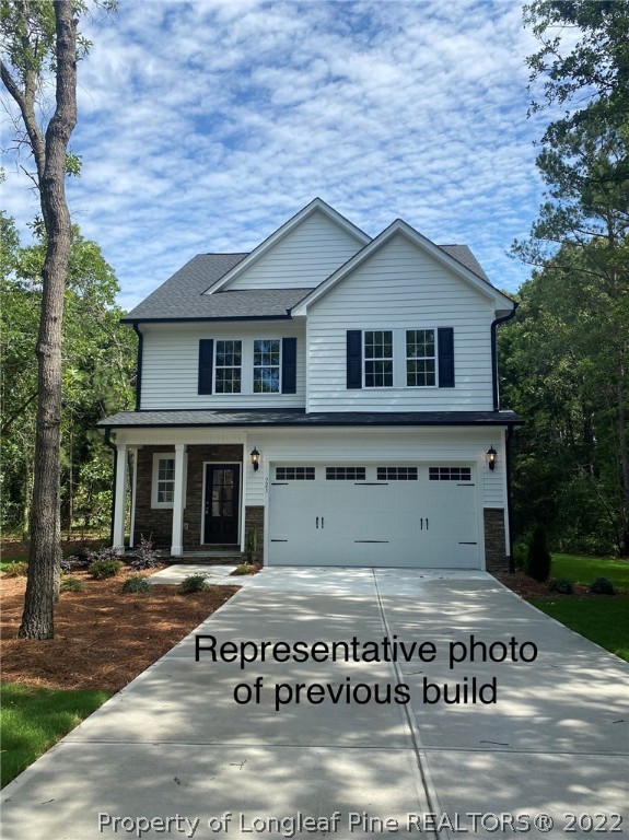 760 Daphne Lane Vass, NC 28394 - Photo 5 of 15 a view of a house with a yard