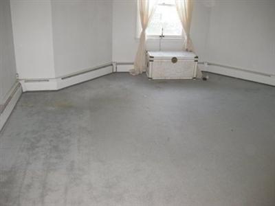 31 Old Stage Road Centerville, MA 02632 - Photo 2 of 4 a view of a white bed and a window in a room