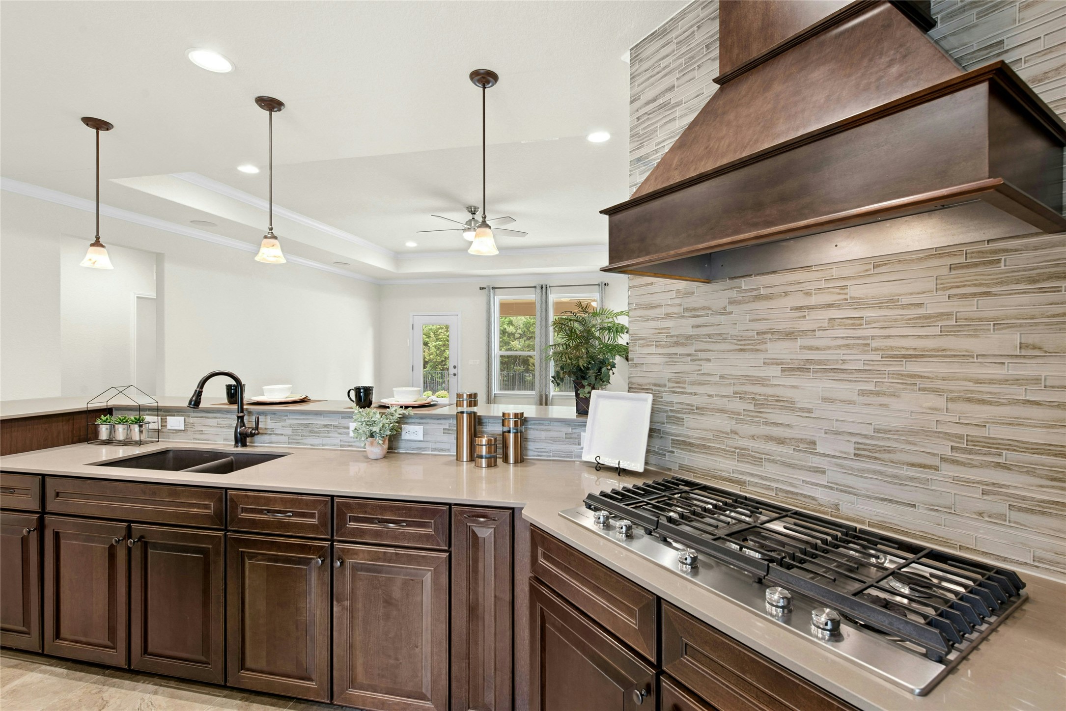 105 Marfa Cove Georgetown, TX 78633 - Photo 11 of 36 a kitchen with sink stove and cabinets