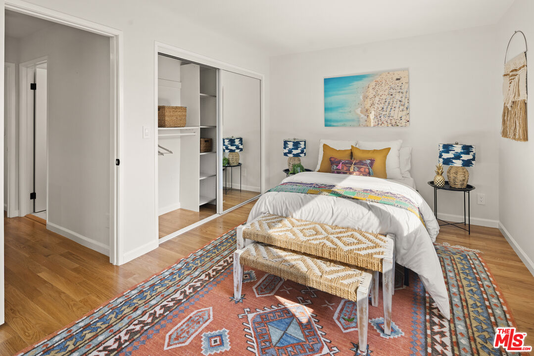 2613 5th Street Santa Monica, CA 90405 - Photo 21 of 30 a bed sitting in a bedroom and a table