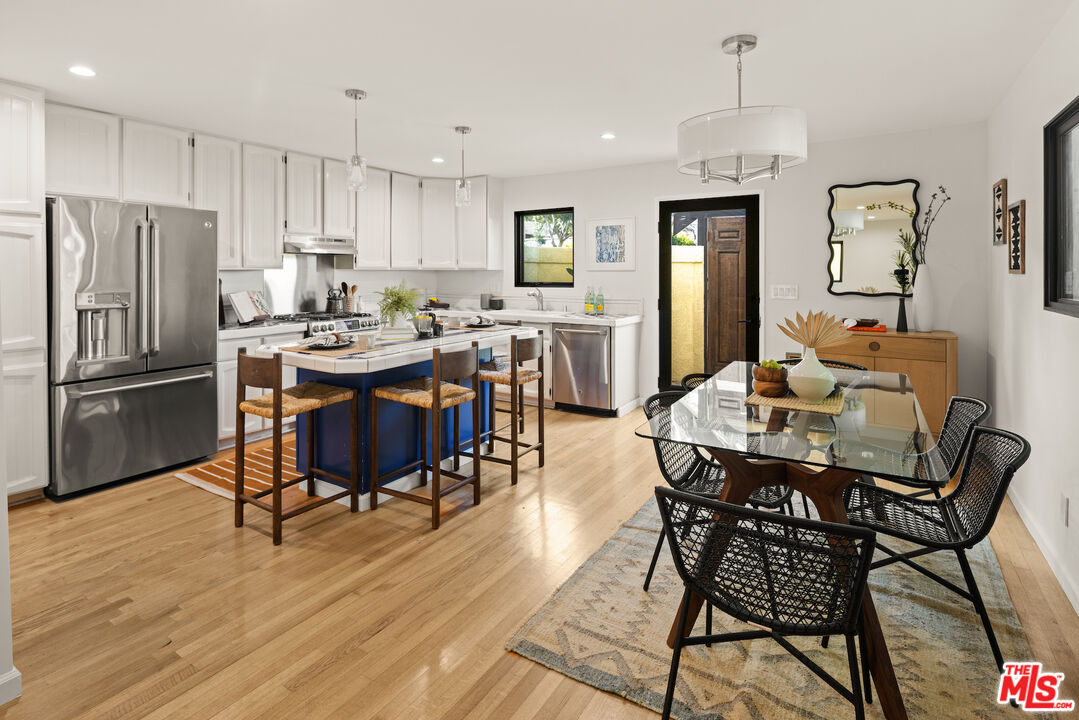 2613 5th Street Santa Monica, CA 90405 - Photo 4 of 30 a view of a dining room with furniture