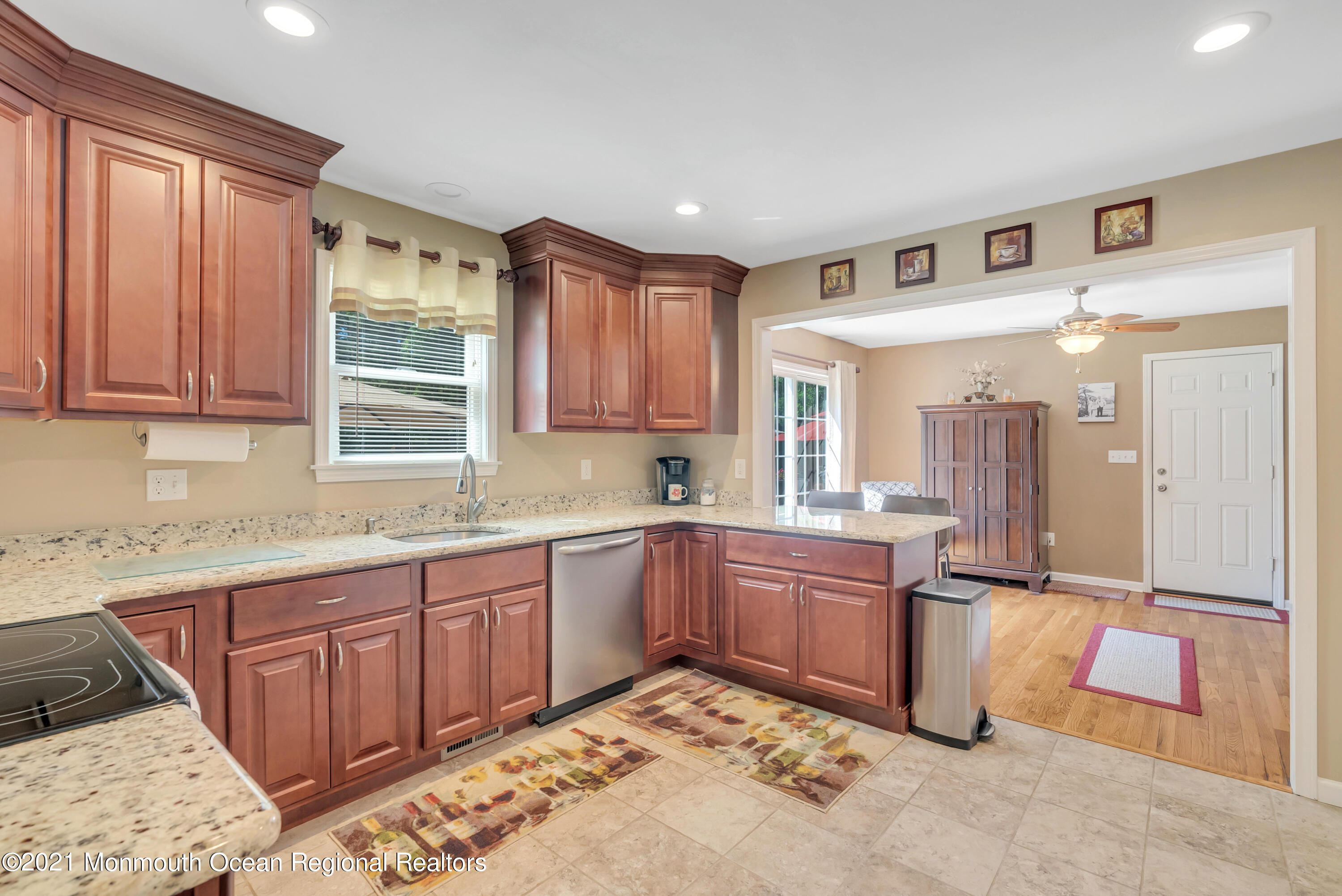 93 Jackson Mills Road Jackson, NJ 08527 - Photo 11 of 39 a kitchen with stainless steel appliances granite countertop a sink stove and refrigerator