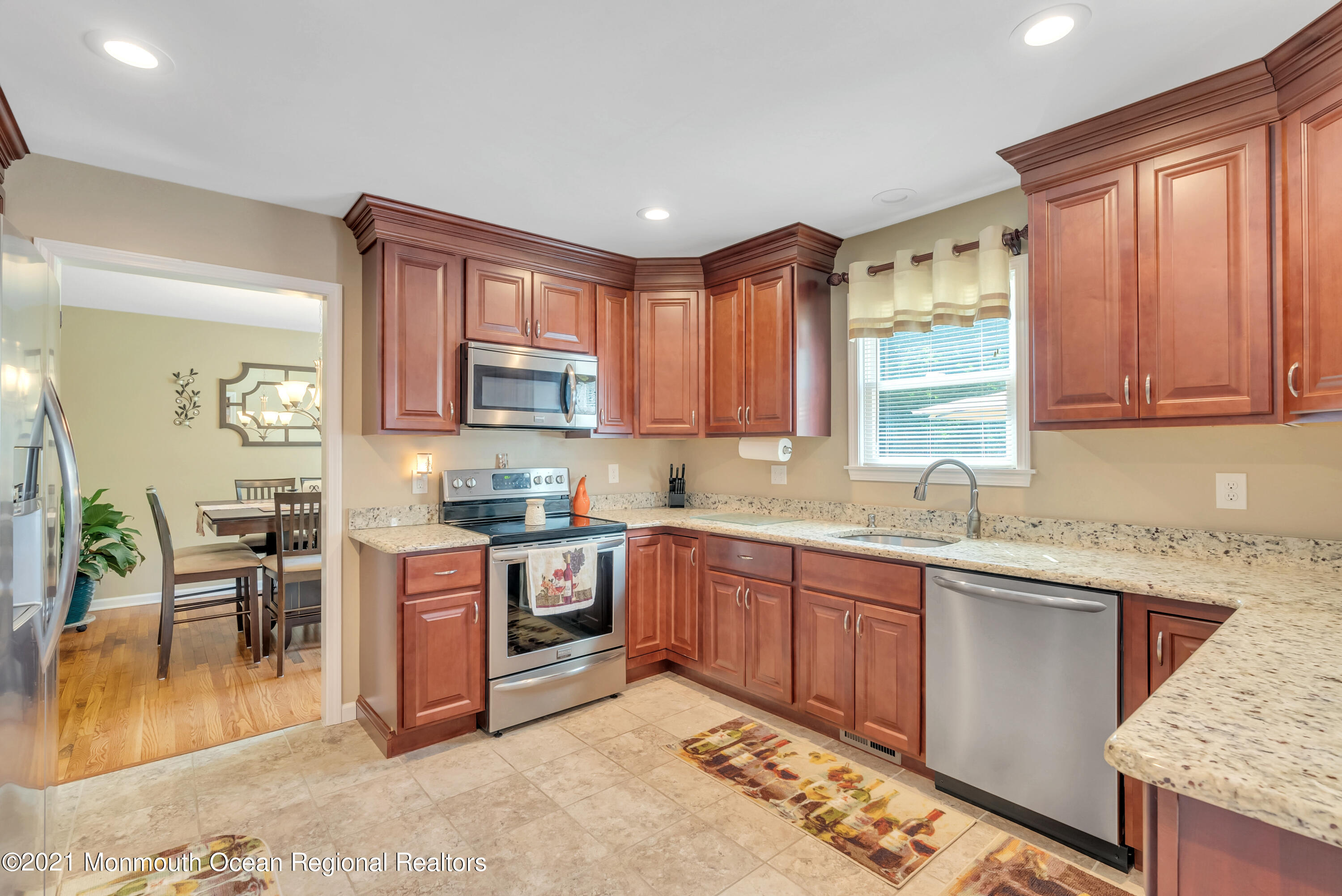 93 Jackson Mills Road Jackson, NJ 08527 - Photo 12 of 39 a kitchen with stainless steel appliances granite countertop sink stove top oven and cabinets