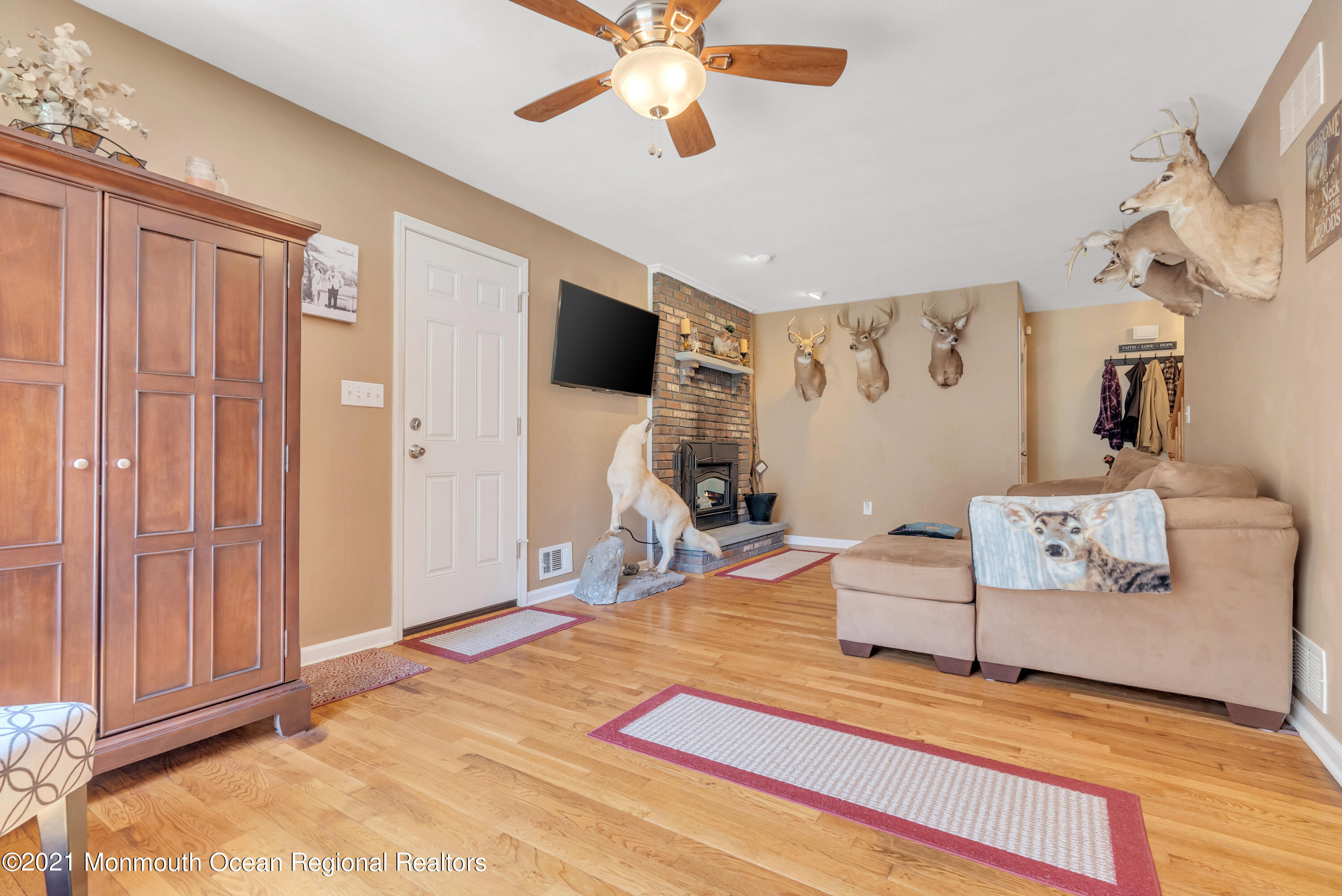 93 Jackson Mills Road Jackson, NJ 08527 - Photo 16 of 39 a living room with furniture and a flat screen tv