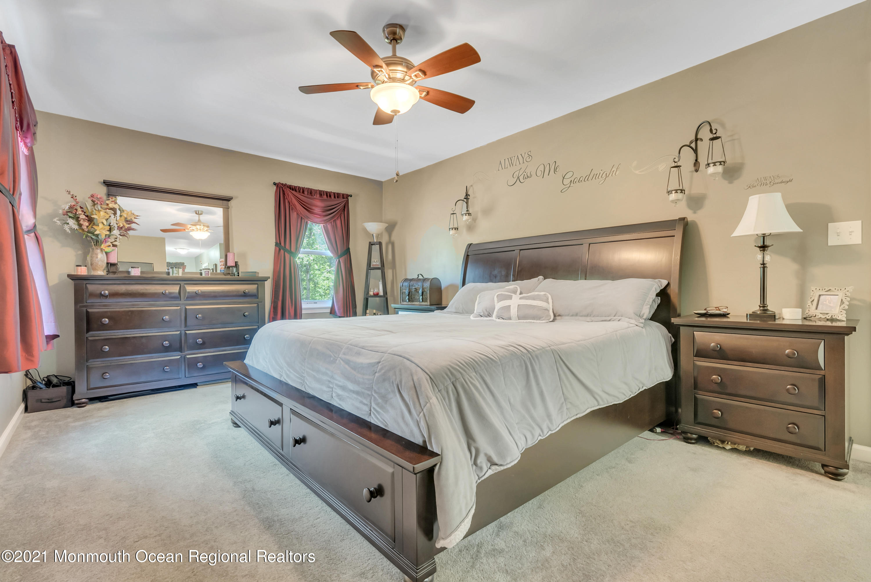 93 Jackson Mills Road Jackson, NJ 08527 - Photo 18 of 39 a bedroom with a bed and a chandelier