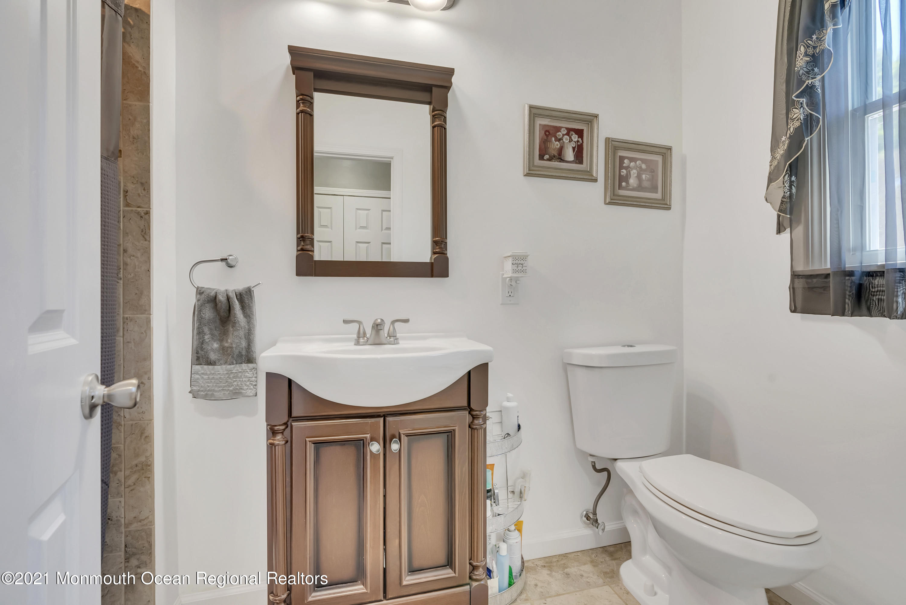 93 Jackson Mills Road Jackson, NJ 08527 - Photo 20 of 39 a bathroom with a toilet sink and mirror