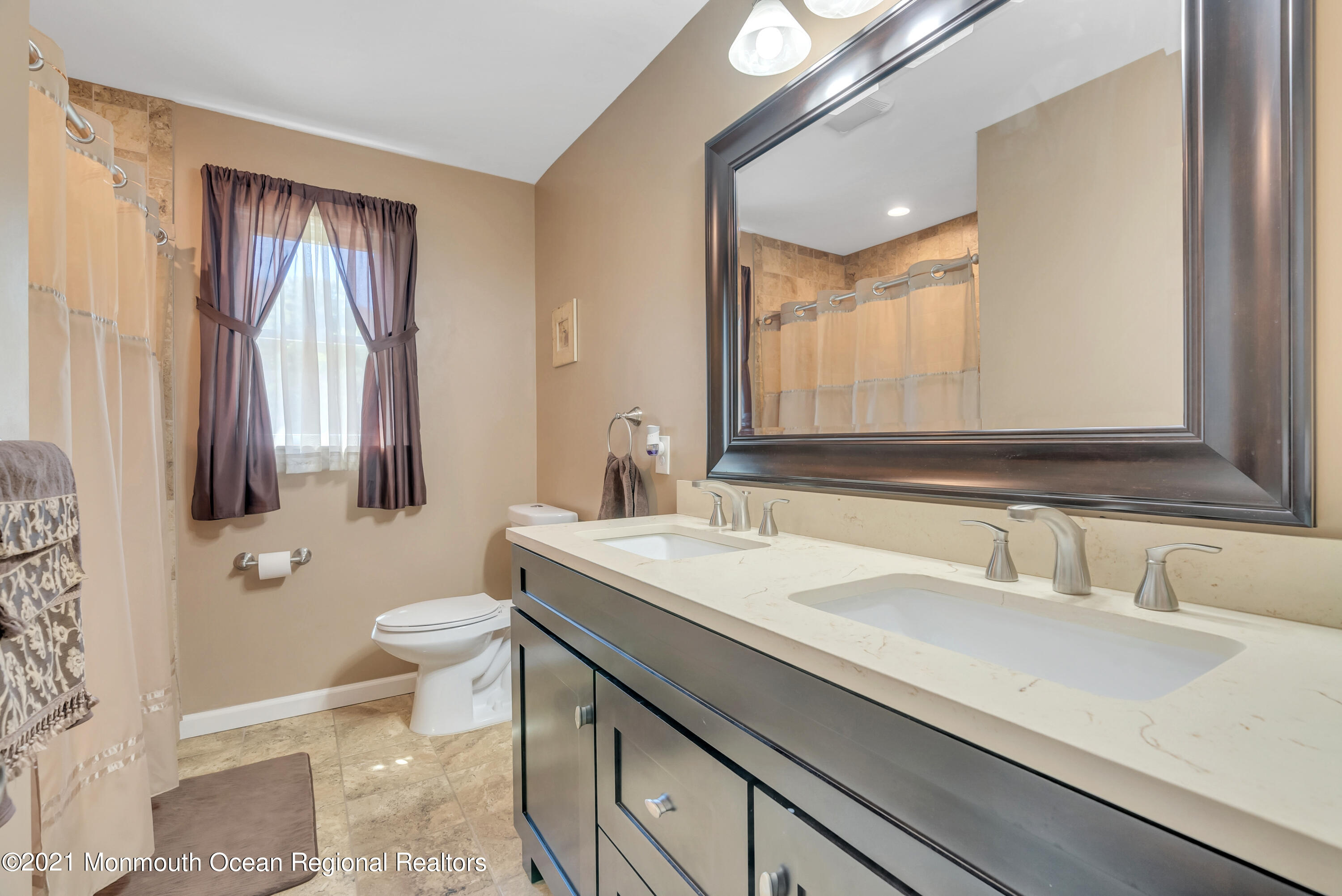 93 Jackson Mills Road Jackson, NJ 08527 - Photo 22 of 39 a bathroom with a sink a toilet and mirror