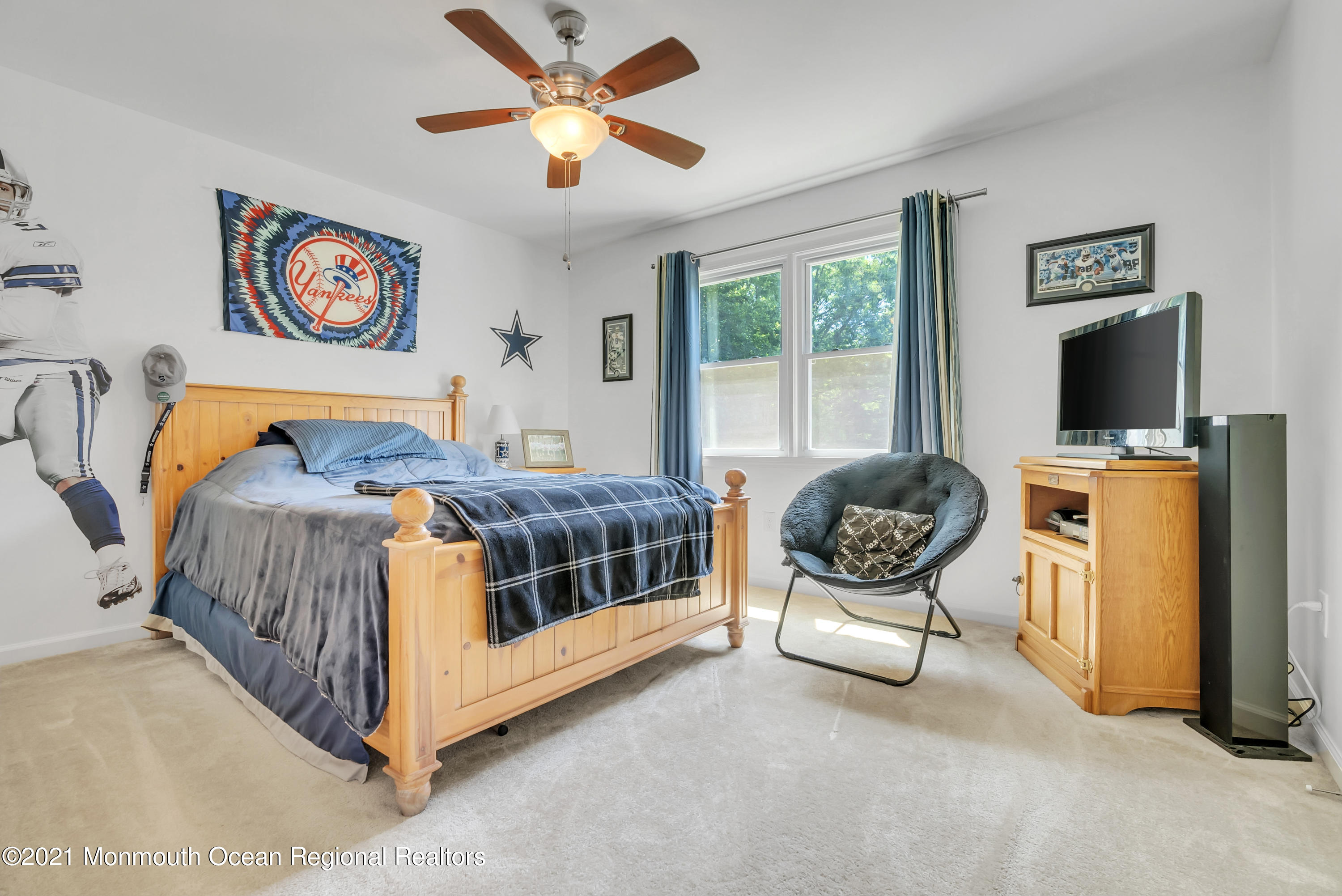93 Jackson Mills Road Jackson, NJ 08527 - Photo 25 of 39 a bedroom with a bed and a chair