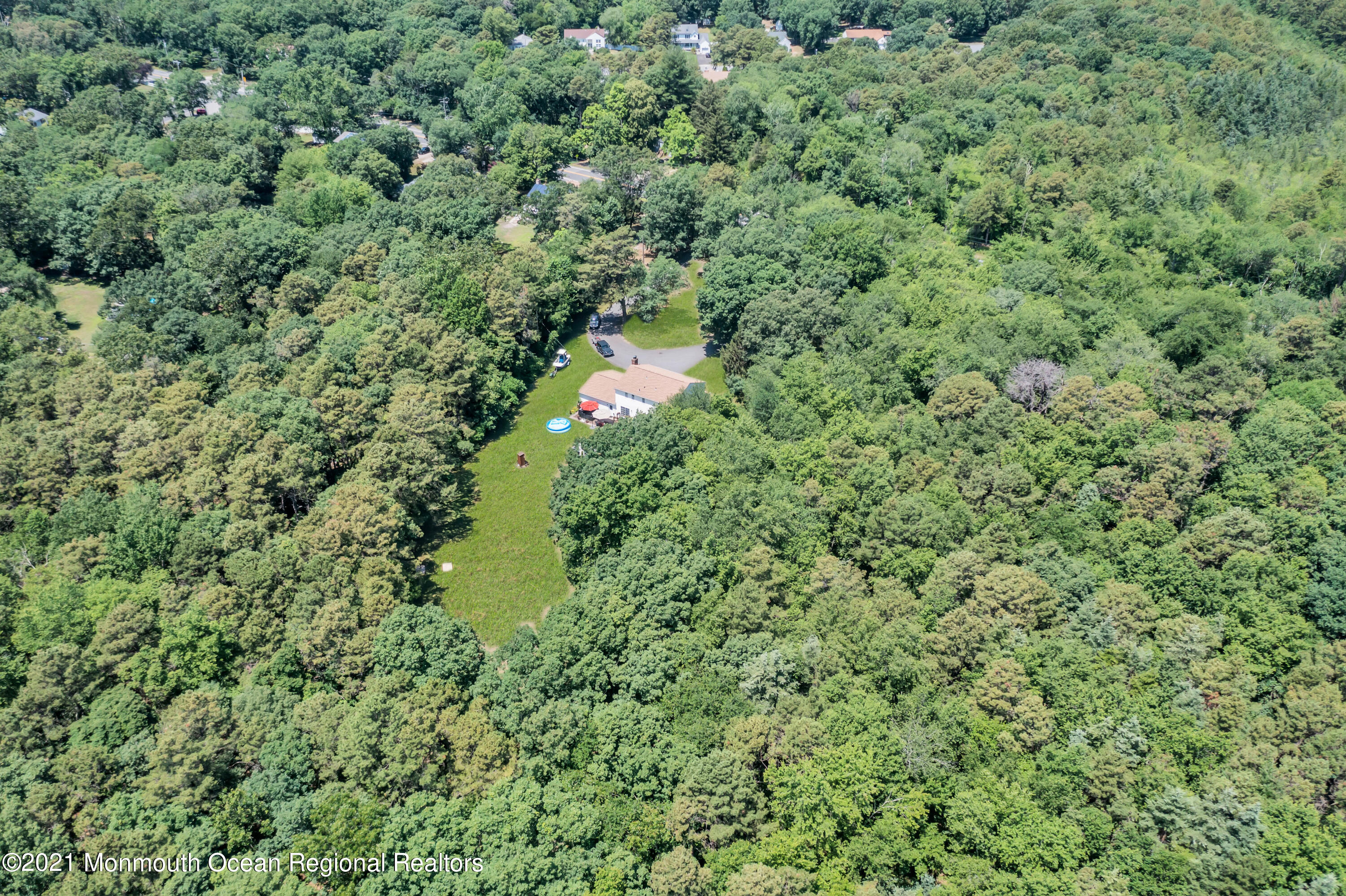 93 Jackson Mills Road Jackson, NJ 08527 - Photo 37 of 39 an aerial view of residential house with outdoor space and trees around