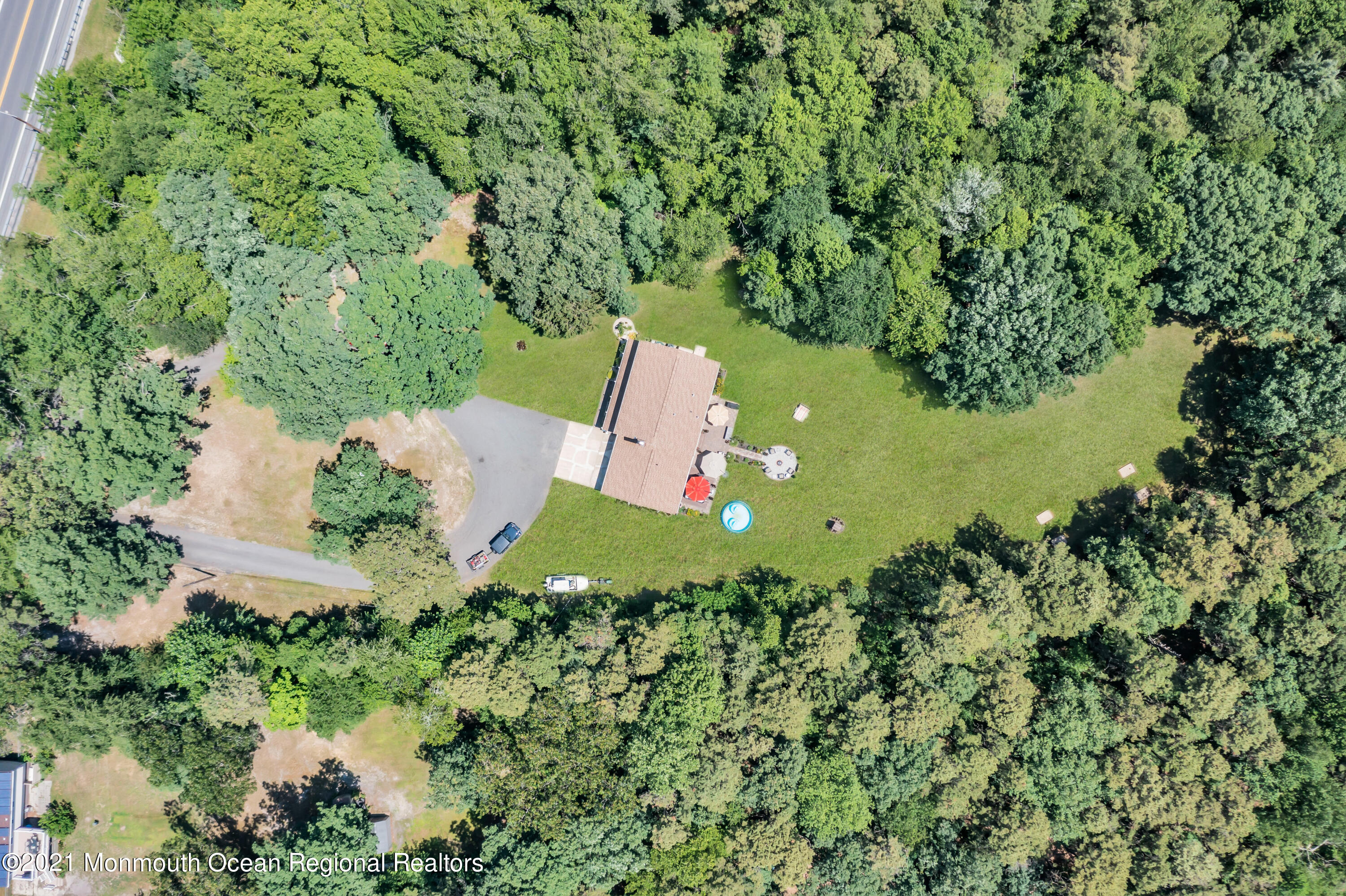 93 Jackson Mills Road Jackson, NJ 08527 - Photo 38 of 39 an aerial view of a house with a yard