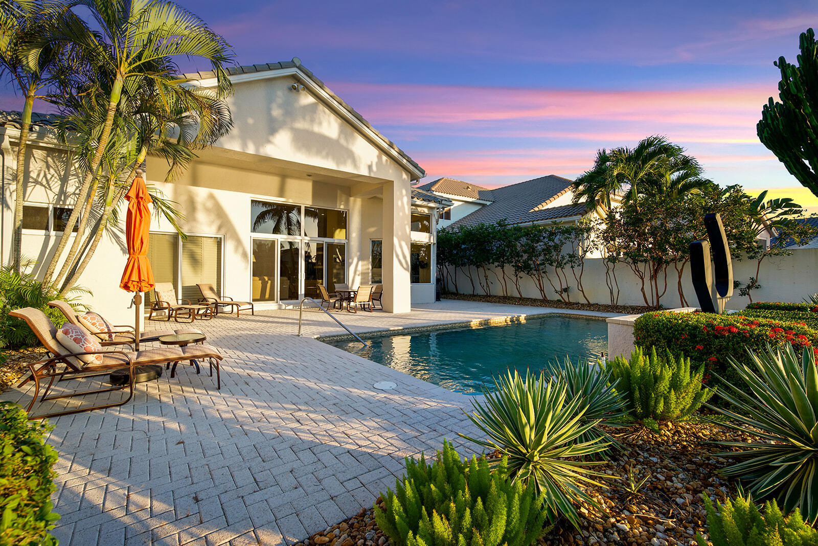 17051 Grand Bay Drive Boca Raton, FL 33496 - Photo 18 of 91 a view of a house with swimming pool and sitting area