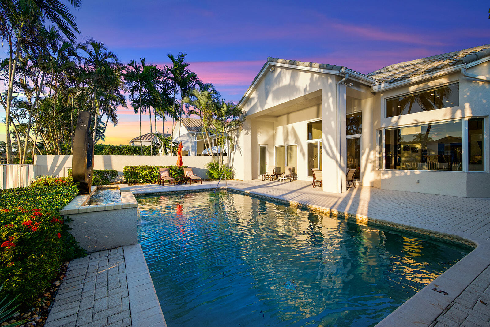 17051 Grand Bay Drive Boca Raton, FL 33496 - Photo 22 of 91 a view of a house with swimming pool