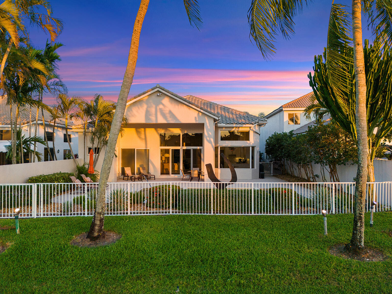 17051 Grand Bay Drive Boca Raton, FL 33496 - Photo 32 of 91 a front view of a house with a yard