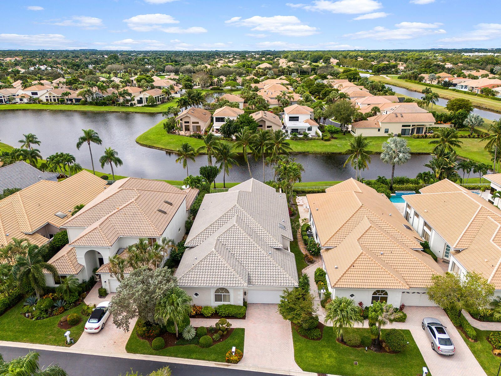 17051 Grand Bay Drive Boca Raton, FL 33496 - Photo 42 of 91 an aerial view of a house with a lake view