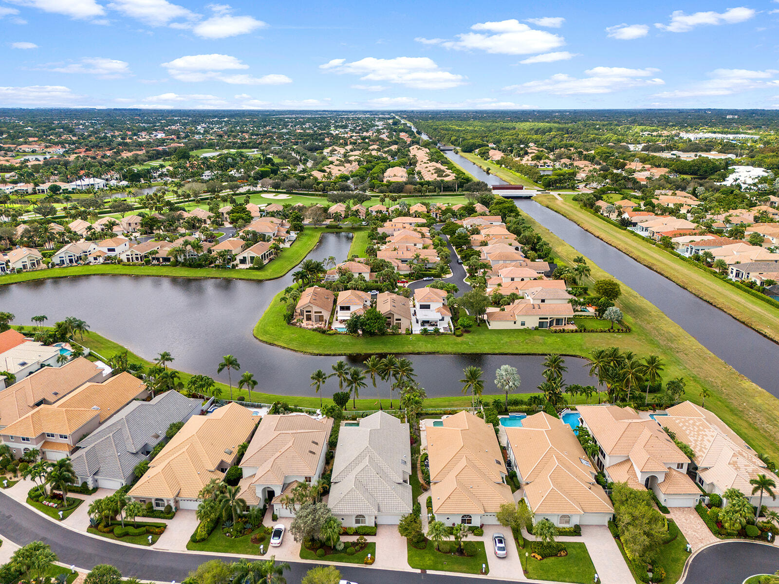 17051 Grand Bay Drive Boca Raton, FL 33496 - Photo 43 of 91 an aerial view of a city with lots of residential buildings ocean and ocean view