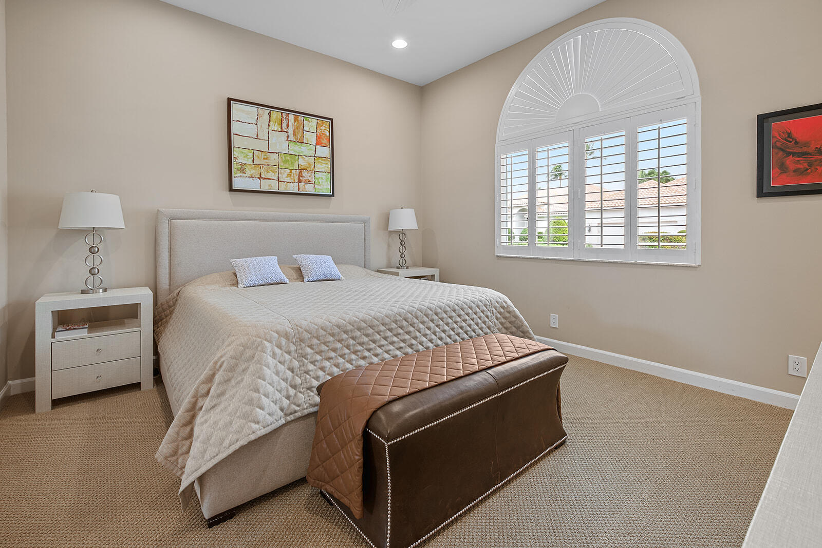 17051 Grand Bay Drive Boca Raton, FL 33496 - Photo 63 of 91 a bedroom with a bed and a painting on the wall