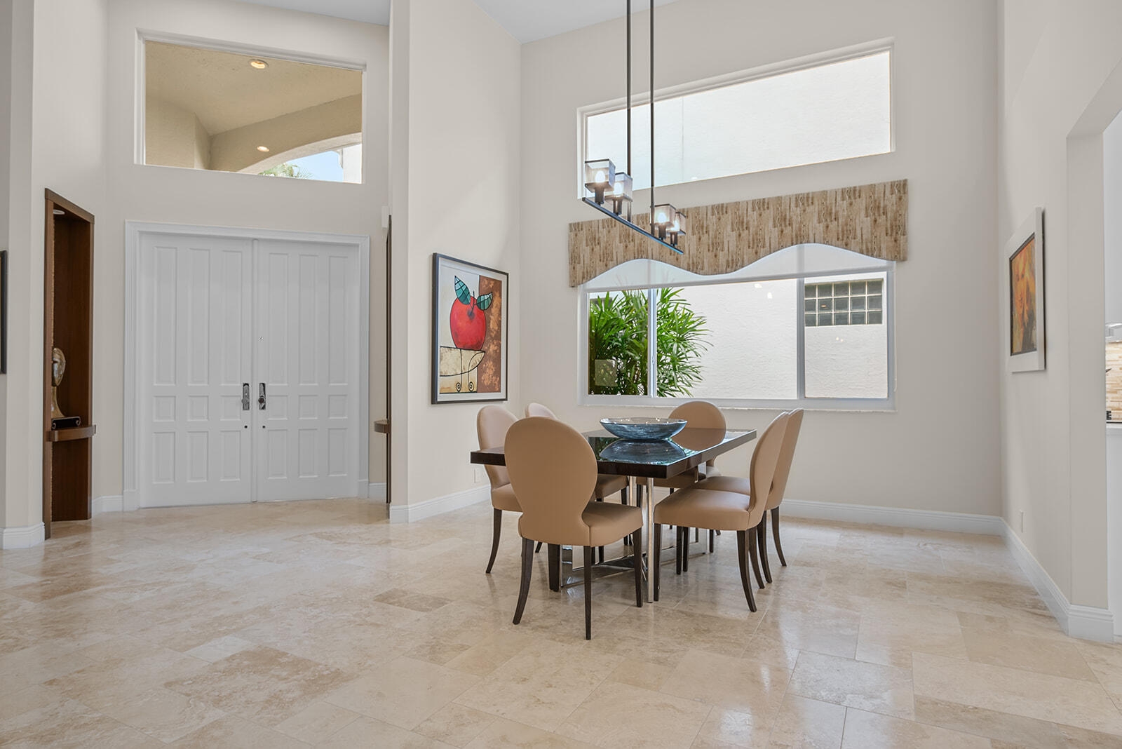 17051 Grand Bay Drive Boca Raton, FL 33496 - Photo 81 of 91 a view of a dining room with furniture and chandelier