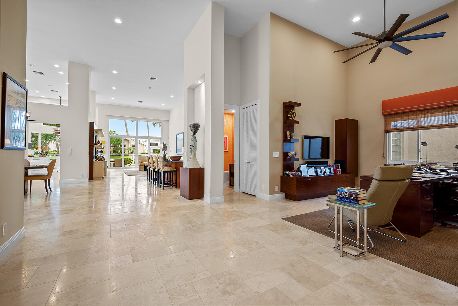 17051 Grand Bay Drive Boca Raton, FL 33496 - Photo 84 of 91 a view of a livingroom with furniture and a flat screen tv