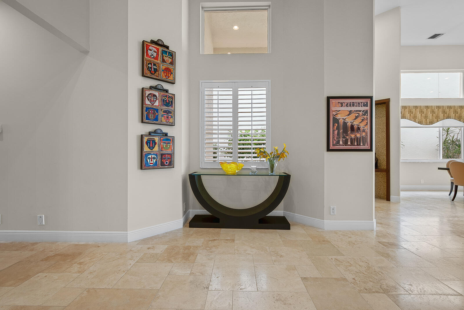 17051 Grand Bay Drive Boca Raton, FL 33496 - Photo 90 of 91 a view of a hallway with paintings on the wall