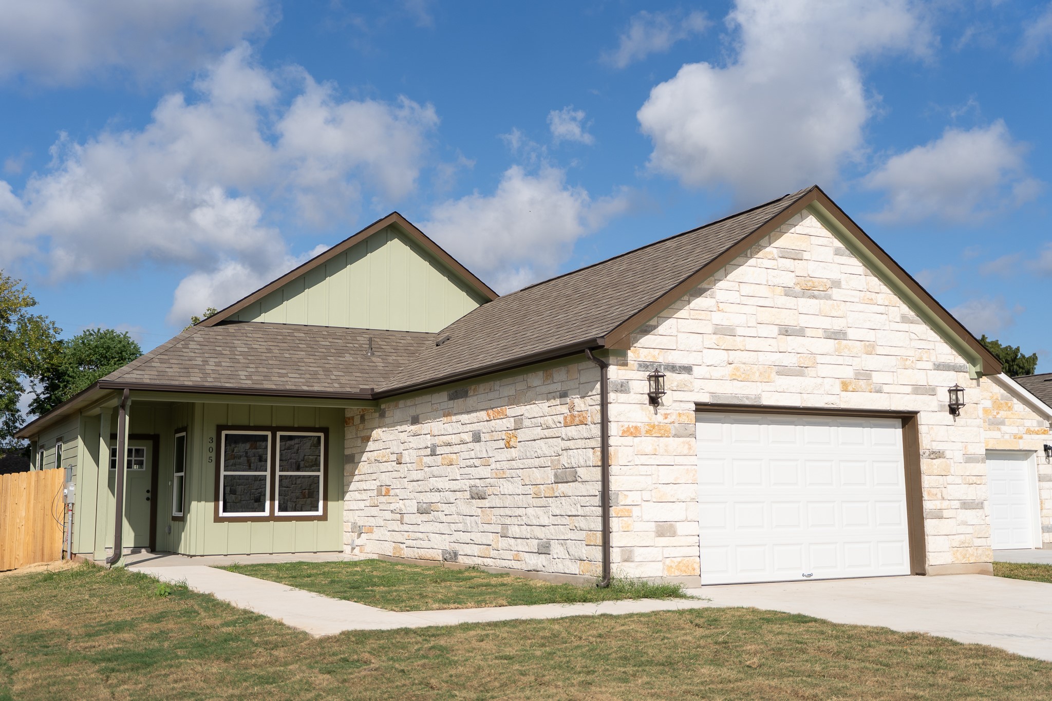 305 String Prairie Way Smithville, TX 78957 - Photo 3 of 26 a view of front of house with garage
