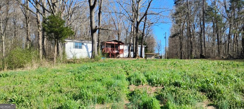 2331 Kesler Road Carnesville, GA 30521 - Photo 3 of 50 a backyard of a house with lots of green space